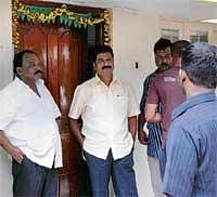 Controversy: Former Food and Civil Supplies Minister Haratal Halappa seen with supporters at his residence in Bangalore after he tendered his resignation on Sunday. DH Photo