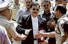 Special Public Prosecutor Ujjwal Nikam being greeted as he comes out of the special court at Arthur Road Jail after pronouncement of verdict in the 26/11 terror attack case in Mumbai on Monday. PTI