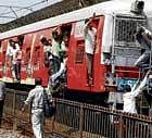 moving on: Stranded passengers board a local train as suburban train services were disrupted after motormen of both Western and Central railways continued with their hunger strike for the second day, in Mumbai on Tuesday. pti