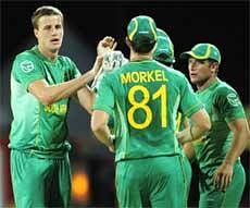 South African bowler Morne Morkel (left) celebrates with teammates the dismissal of Afghan batsman Karim Sadiq during the World Twenty20 at the Kensington Oval on Wednesday. AFP