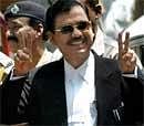 Special Public Prosecutor Ujjwal Nikam flashes victory signs. PTI