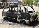 The Maruthi van that was set fire at Kundalagurki, Shidlaghatta on Wednesday night.