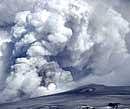 Volcano emits more ash, fresh closures expected