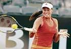 back to form: Serbias Ana Ivanovic en route to her quaterfinal victory over Russias Nadia Petrova in the Italian Open on Friday. Ivanovic won 6-2, 7-5. AP