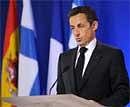 French President Nicolas Sarkozy speaks during an extraordinary European Union summit at the European Council headquarters in Brussels on Friday. AFP