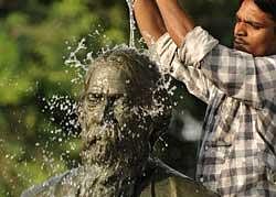 Statue of poet Rabindranath Tagore being cleaned on the eve of his 150th birth anniversary in Allahabad. The 150th birthday of Tagore, Asia's first Nobel laureate for literature, will be celebrated in India and Bangladesh. AFP