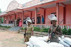 Polling being held amidst tight security at Someshwarapete polling booth in Nadpalu Gram Panchayat on Saturday.