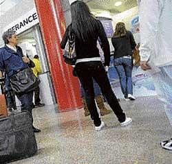 Passengers wait after flights were cancelled from the Peinador airport in Vigo, northwestern Spain, on Saturday. AFP