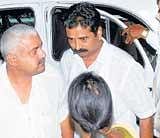 GUILTY OR INNOCENT: Former minister H Halappa taken to hospital by CID police in Shimoga on Sunday. DH PHOTO