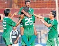 Show-stopper: HASCs Xavier Vijay Kumar (center) celebrates with team-mates after scoring against Mohammedan Sporting in their I-League Second Division match on Sunday. Dh photo