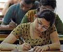 Students writing the Comed-K entrance exam at Jain College in Bangalore on Sunday. dh photo