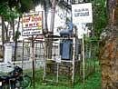 A board attached to a transformer makes up for a bus stop in Kalena Agrahara. DH photo