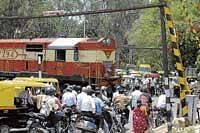 A file photo of an unmanned railway crossing in the City.