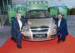 GM India President Karl Slym (left) with VP Corporate Affairs P Balendran posing with the car.