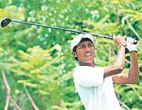 Swinging form: Local lad S Chikkarangappa fired a six-under 66 in the opening round at the Eagleton Golf Resort on Thursday. DH photo