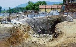 Bone of contention: A huge pit is being dug at Hogenakal as part of Tamil Nadus  controversial drinking water project. DH Photo