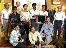 (Second row, left to right) Topper Rajat G Bhushan of Bangalore, third prize winner Sujay Babruwad of Hubli and second prize winner N Krishnakumar of Madurai, pose with US  embassy officials in Chennai.