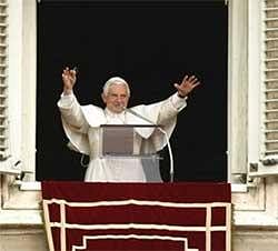 Pope Benedict XVI blesses faithful from the window of his studio overlooking St. Peter's Square, at the Vatican, Sunday, May 16, 2010. AP Photo