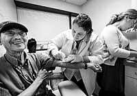 scarce workforce Rebecca Anderson, a nurse, draws blood from a patient at the Hep B clinic in San Francisco, US. NYT