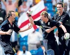 England skipper Paul Collingwood (centre), Kevin Pietersen (right) and Graeme Swann celebrate after winning the World T20 title at Barbados on Sunday. AFP