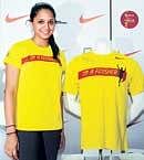 Dipika Pallikal unveils the Nike performance tee for the Sunfeast 10K in Bangalore on Monday. DH Photo