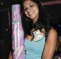 Miss USA Rima Fakih is shown after winning the grand prize at Stripper 101 event in Detroit in 2007. AP