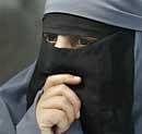 France's Kenza Drider, dressed in a niqab, speaks with reporters during a press conference in Montreuil, east of Paris, Tuesday . AP