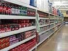 major cause for obesity Soda and other sugary drinks stacked prominently in a store.
