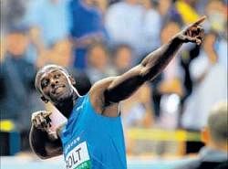 Usain Bolt slips into customary celebration mode after sprinting to the 100M gold at the Daegu Grand Prix on Wednesday. AFP