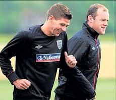 Steven Gerrard (left) and Wayne Rooney at a training session at Irdning in Austria on Wednesday. AFP