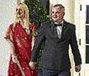 This November 24, 2009 photo shows Tareq Salahi and Michaele Salahi arriving for the State Dinner in honour of Prime Minister Manmohan Singh at the White House in Washington, DC. AFP