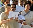 Congress President Sonia Gandhi (left) and her daughter Priyanka Gandhi attend a memorial ceremony for Prime Minister Rajiv Gandhi on his 19th death anniversary in New Delhi on Friday. AFP