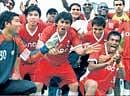 ONGC players celebrate their entry into the I-League proper after beating SESA 2-0 in a sixth round match of the I-League Second Division on Friday. DH PHOTO