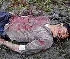 The body of a slain rhino poacher in the Kaziranga National Park in Assam on Friday. AFP