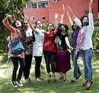 over the moon: Students celebrating their success in CBSE class 12th examination at their school in New Delhi on Friday. PTI