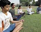 De-stressing IIT Delhi  students  practising Sudarshan Kriya on their  campus lawns. Photos/ Sanjay Austa