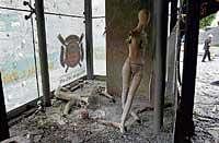 Damaged mannequins lie in a shop inside the torched Central Mall shopping complex in Bangkok on Saturday. Reuters