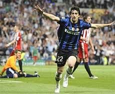 nter Milan forward Diego Milito celebrates scoring his second goal during the Champions League final against Bayern Munich in Madrid on Saturday. AP