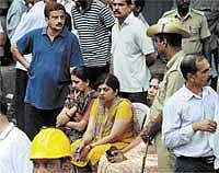 Grieving relatives try to identify bodies