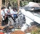 Missing Links: DGCA team members searching for black box at the crash site near Mangalore airport on Sunday. DH Photo