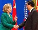 US Secretary of State Hillary Clinton (left) speaks with Chinese President Hu Jintao during the opening session of the second round of the US-China Strategic and Economic Dialogue at the Great Hall of the People in Beijing on Monday. AP