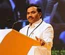 Telecom minister A Raja speaks at a press conference in Hyderabad on Monday. Reacting to Prime Minister Manmohan Singhs comment, Raja said he was ready to face any probe over the 2G spectrum scandal. AFP