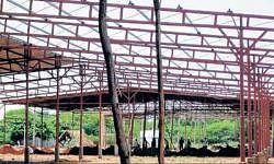 Gearing up for season : Mango mandies under construction at APMC yard in Srinivaspur. DH Photo