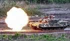 A South Korean tank fires during an exercise to prepare for a possible surprise attack by North, near the demilitarised zone separating the two Koreas in Yeoncheon on Tuesday. AP