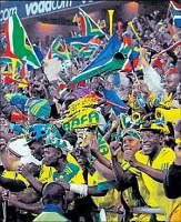 Fan fare: South African supporters cheer their team  during a friendly match against Bulgaria on Monday. AFP
