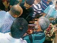 Family members of Joen Saldanha paying homage to his body at Niddodi church in Moodbidri.
