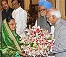 President Pratibha Patil is greeted by Vice President Hamid Ansari and Prime Minister Manmohan Singh before she leaves for China, in New Delhi on Wednesday. PTI
