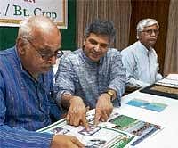 Keep BT Crop At Bay: Western Ghats Task Force member  Kumarswamy and Chairman Anantha Hegde Ashisara at a  workshop in Bangalore on Wednesday. Biofuel Task Force  Chairman Y B Ramkrishna is seen. DH Photo