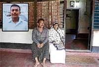 Parents of Naved Ibrahim Siraj (inset) at their house in  Udupi.