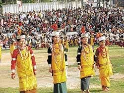 tribals Khasi women performing a traditional dance.